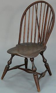 Windsor brace bow back side chair having saddle seat on bold turned legs. 
total height 35 inches, seat height 16 inches
Prov