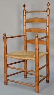 Primitive ladder back great chair with rush seat (legs ended out).   height 45 1/2 inches