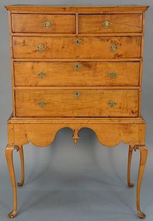 Maple chest on frame having two drawers over three drawers set on base with cabriole legs ending in pad feet, 18th century.