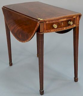 George III mahogany pembroke table with oval drop leaves and one drawer, having banded inlaid top and set on square tapered l