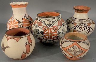 Five Acoma pottery pieces to include three Ollas (one signed Petra Lucero), and two vases, each with polychrome decoration.