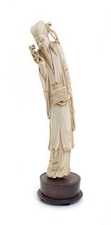 A Chinese Carved Ivory Bearded Figure, Height 16 inches.