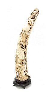 A Chinese Carved Ivory Figure of Shoulao, Height 18 inches.