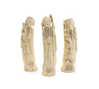 A Group of Three Chinese Carved Ivory Figures of Fu Lu Shou, Height of tallest 10 1/2 inches.