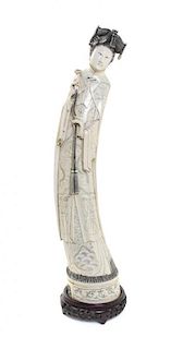 A Chinese Carved Ivory Figure of an Empress, Height 24 inches.