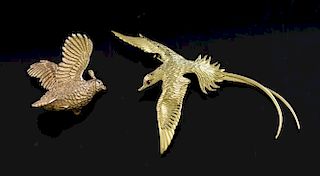 Two god bird pins
