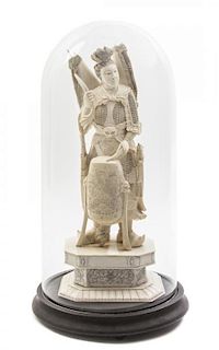 A Chinese Carved Ivory Figure of a Military Drummer, Height 16 1/4 inches.