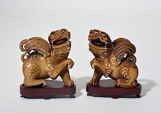 Pair of Chinese carved & jeweled ivory foo lions