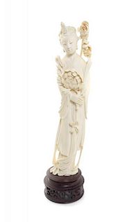 A Chinese Carved Ivory Figure of a Lady, Height 12 1/8 inches.