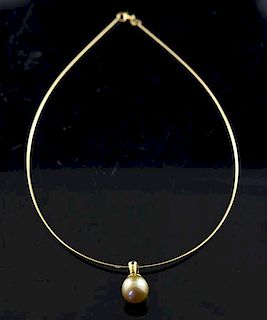18k yellow gold chain with a golden south sea pearl