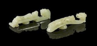 Two Carved Jade Belthooks, Length 3 3/4 inches.