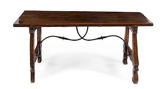 A Spanish Baroque Walnut Trestle Table Height 29 x width 61 1/2 x depth 27 1/2 inches.