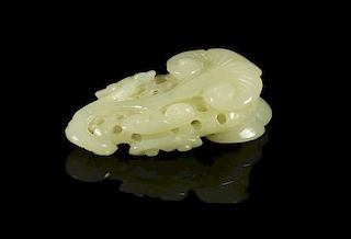 A Carved Jade Toggle, Width 3 1/8 inches.
