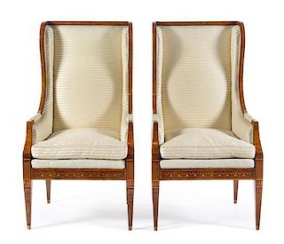 A Pair of Italian Marquetry and Parquetry Wingback Bergeres Height 51 1/4 x width 24 3/8 x depth 24 3/8 inches.
