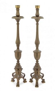 * A Pair of Baroque Style Brass Pricket Sticks Height overall 37 inches.