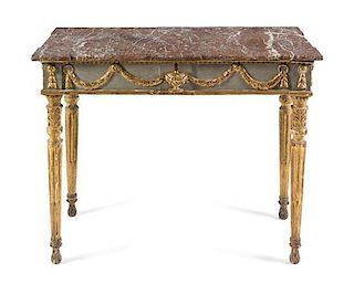 An Italian Painted and Parcel Gilt Center Table Height 34 x width 44 x depth 23 1/2 inches.