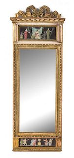 An Italian Neoclassical Giltwood and Verre Eglomise Pier Mirror Height 61 3/4 x width 23 1/2 inches.