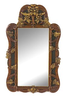 A Continental Painted and Gilt Mirror Height 39 x width 24 1/2 inches.