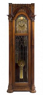A German Gothic Revival Tall Case Clock Height 88 3/4 x width 29 1/4 x depth 17 3/4 inches.