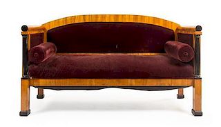 * A Biedermeier Parcel Ebonized Birch Sofa Height 39 x width 67 inches.