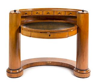 * A Biedermeier Fruitwood Writing Table Height 37 x width 46 inches.