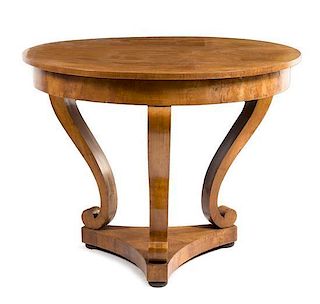 * A Biedermeier Fruitwood Center Table Height 30 x diameter 39 inches.