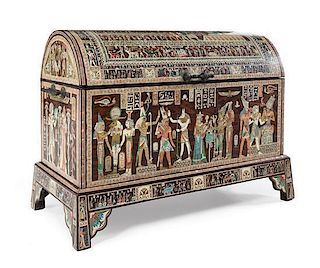 An Egyptian Revival Mother-of-Pearl Inlaid Trunk on Stand Height of chest 26 x width 44 1/2 x depth 20 1/4 inches.