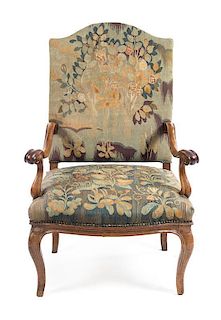 * A Regence Walnut Armchair Height 44 1/4 inches.