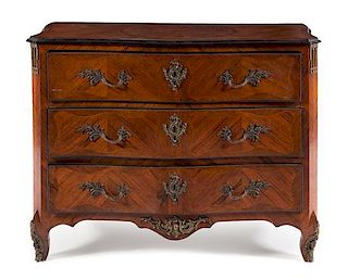 A Regence Style Bronze Mounted Rosewood Commode Height 39 1/4 x width 51 x depth 25 1/4 inches.