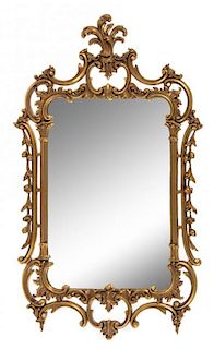 A French Rococo Style Giltwood Mirror Height 49 x width 30 inches.