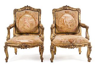 A Pair of Louis XV Style Giltwood Fauteuils Height 42 1/2 inches.