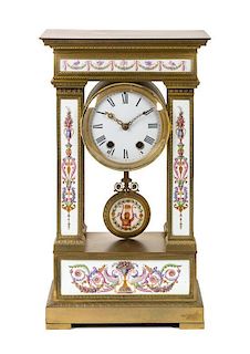 A Louis XVI Style Porcelain Inset Gilt Bronze Mantel Clock Height 21 1/2 inches.