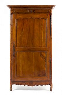 A Louis Philippe Walnut Armoire Height 79 1/8 x width 45 1/4 x depth 25 inches.