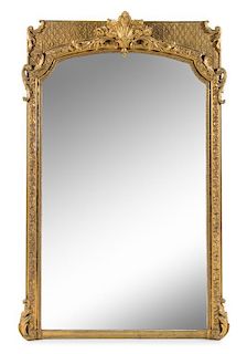 A Napoleon III Giltwood and Composition Mirror Height 75 x width 50 inches.