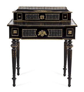 A Napoleon III Mother-of-Pearl Inlaid Ebonized Desk Height 36 1/4 x width 30 3/4 x depth 21 inches.