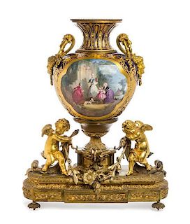 A Sevres Style Gilt Bronze Mounted Porcelain Urn Height 30 1/4 inches.