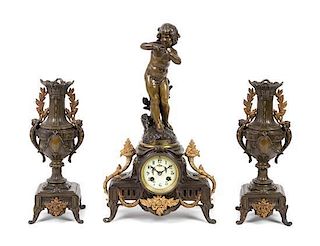 A French Bronze and Cast Metal Clock Garniture Height of mantel clock 18 3/4 inches.