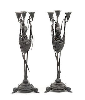* A Pair of French Bronze Three-Light Candelabra Height 20 inches.