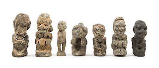 * A Group of Seven Stone Figures Height of tallest 8 3/4 inches.