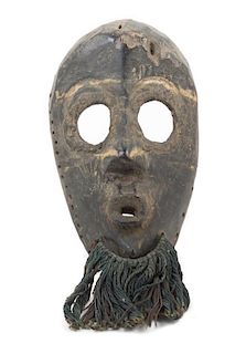 * A Dan Poro Society Wood Mask Height 11 inches.