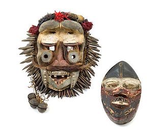 * Two Wobe Wood Masks Height of taller example 16 inches.