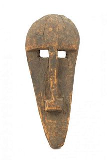 * An Igbo Wood Mask Height 15 1/4 inches.