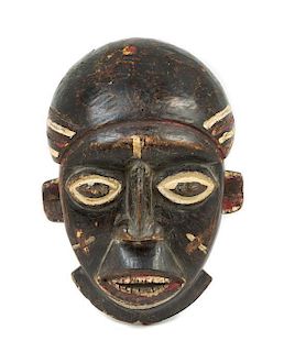 * A Babanki Wood Mask Height 13 3/8 inches.