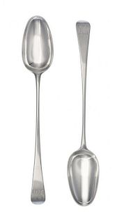 A Pair of George III Silver Serving Spoons, William Fearn, London, 1776, the Old English handle with an engraved crest of a s