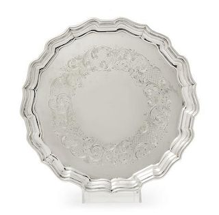 A Canadian Silver Salver, Henry Birks & Sons, Montreal, Quebec, 1939, having a scalloped rim and border, the field with engra