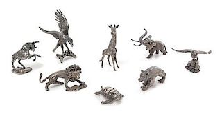 A Group of Eight French Silver Miniature Animal Figures, Cartier, Paris, 20th Century, comprising a bull, elephant, seagull, 