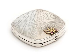 An American Silver, 14-Karat Gold and Ruby Inset Compact, Tiffany & Co., New York, NY, 20th Century, the engine turned lid wi