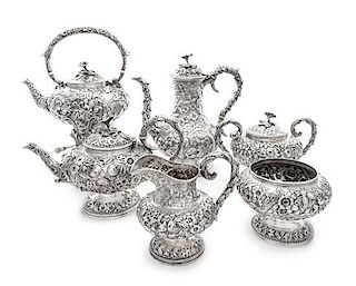 An American Silver Six-Piece Tea and Coffee Service, S. Kirk & Son, Baltimore, MD, Repousse pattern, comprising a water kettl