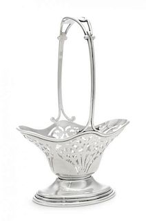 * An American Silver Basket, William B. Durgin Co., Providence, RI, 20th Century, having a fixed handle and a pierced body.