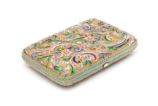 * A Russian Silver-Gilt and Enameled Cigarette Case, Maker's Mark Obscured, 20th Century, the case with polychrome floral and